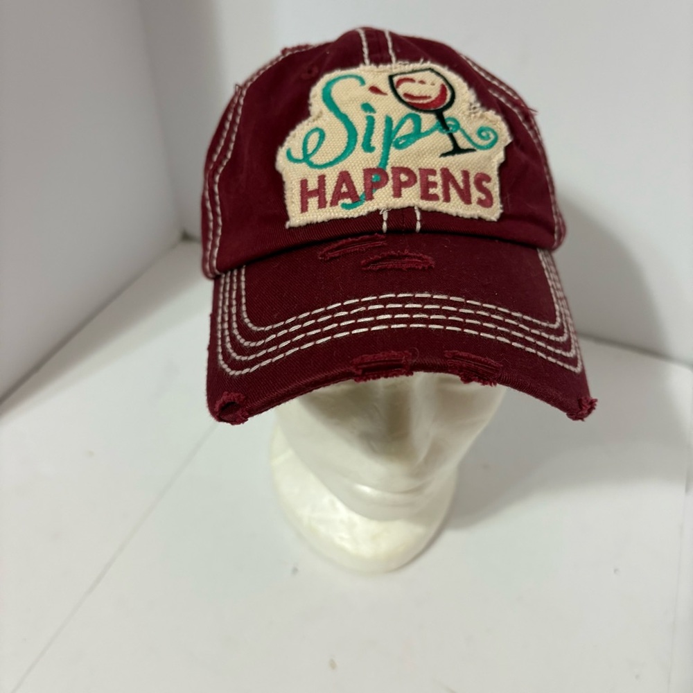 Embroidered Cap "Sip Happens" in teal and brown, a with a smiling wine glass. - Picture 1 of 6